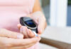 Glucose Spikes CRUSHED By Simple Exercise Person using a blood glucose meter to check their blood sugar level