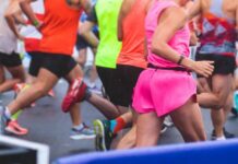 GLOBAL Running Challenge Takes Off Runners participating in a marathon, wearing colorful athletic gear