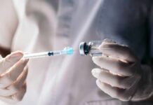 Weight-Loss Drugs: Secret Cardiovascular Warriors? A healthcare professional preparing a syringe from a vial