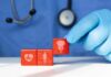 Unseen Female Struggles: The Perimenopause Puzzle A doctor's gloved hand placing red blocks with health symbols on a table