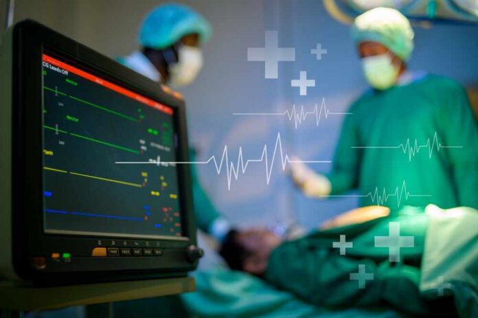 Death,Man,Patient,In,Operating,Room,,,Professional,Doctors,Team Medical professionals in an operating room monitoring a patient