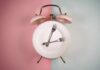 Night Snacks Impact on Your Blood Pressure An alarm clock with a plate and two forks arranged in a creative design