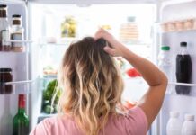 Viscous Fiber Outsmarts Hunger Cravings Person looking into an open refrigerator