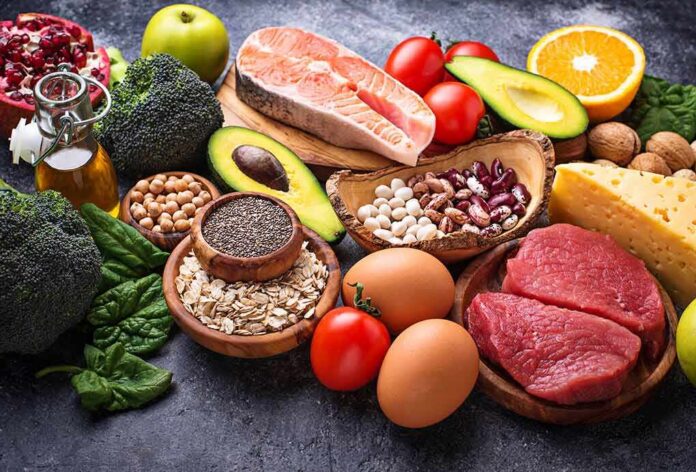 shutterstock_1046974981 Assorted healthy foods arranged on a dark surface