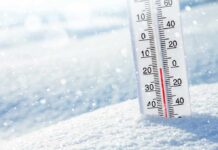 Hidden Danger of Cold Homes, For Senior Brains Thermometer in snow showing subzero temperature