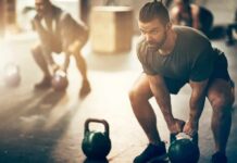 This Overlooked Mineral May Protect Muscles Just As Much As Protein Man lifting a kettlebell in a gym