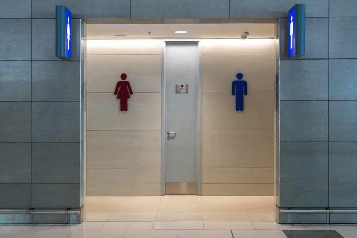Public restroom entrance with male and female symbols