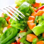 mixed vegetables with broccoli and carrots on a plate
