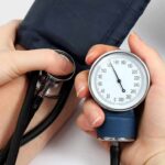 Hypertension Drop From One Snack Swap Blood pressure measurement with sphygmomanometer and stethoscope