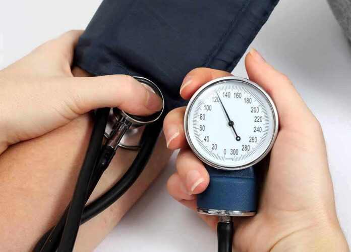 Blood pressure measurement with sphygmomanometer and stethoscope