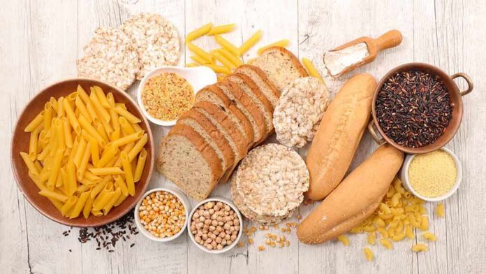 1783890433735-mdw6kc-shutterstock-1020163204 Assorted grains and breads on a wooden table