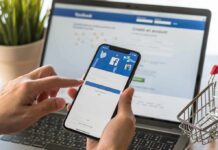 Hands using a smartphone with a social media login screen