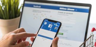 Hands using a smartphone with a social media login screen
