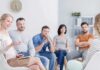 Brutal Self-Talk Tied To ADHD Support group meeting with six adults seated in a circle