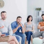 Brutal Self-Talk Tied To ADHD Support group meeting with six adults seated in a circle