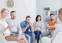 Support group meeting with six adults seated in a circle