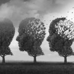 Three trees shaped like human heads losing leaves