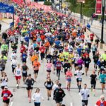 Large crowd of runners in a city marathon