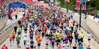 Large crowd of runners in a city marathon