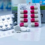Stop-Pill Shock For Eczema Sufferers Assorted pills and blister packs on a pharmacy counter