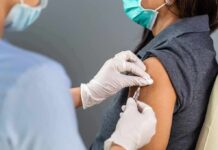 GLP-1 Hangover: Hunger Avalanche After Skinny Jabs Healthcare worker administers vaccine to patient’s upper arm