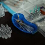 Measles Alarm Hits Connecticut Medical syringes and vials arranged on a table