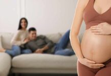 Baby Market Boom | Why the world wants American surrogates Pregnant woman holding her belly in a living room