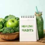 Everyday Silent Habits Fueling Inflammation Basket of green vegetables with apple, notebook, and green smoothie