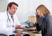 Silent Cancer’s Two-Week Warning Signs doctor talking to concerned woman in office