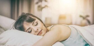 Woman sleeping on a bed
