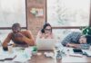 2 P.M. Wall? | Tips to Overcome the ‘Afternoon Slump’ tired coworkers at a cluttered desk