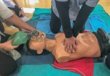CPR training on a manikin with chest compressions and bag-valve-mask ventilation
