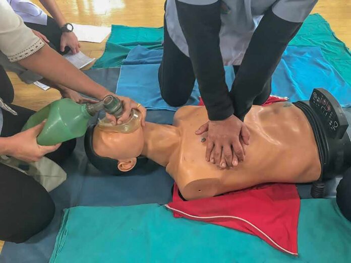 CPR training on a manikin with chest compressions and bag-valve-mask ventilation