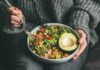 Plant-Based Trap Ages Bodies Fast person holding a bowl of salad with avocado