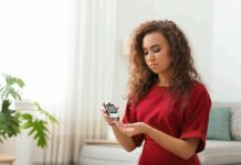 Hidden Non-Food Culprit Spiking Blood Sugar Woman using a blood glucose meter at home