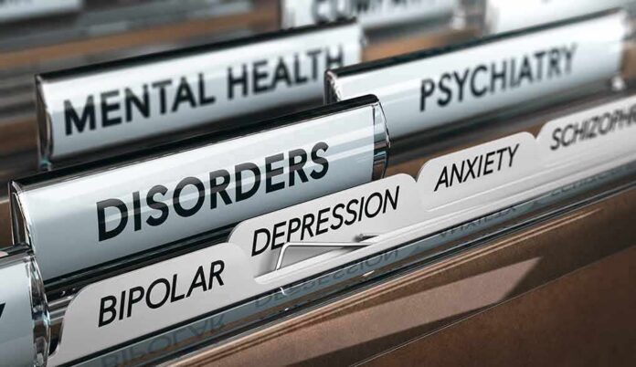 shutterstock_758549185 File drawer with tabs labeled for mental health disorders